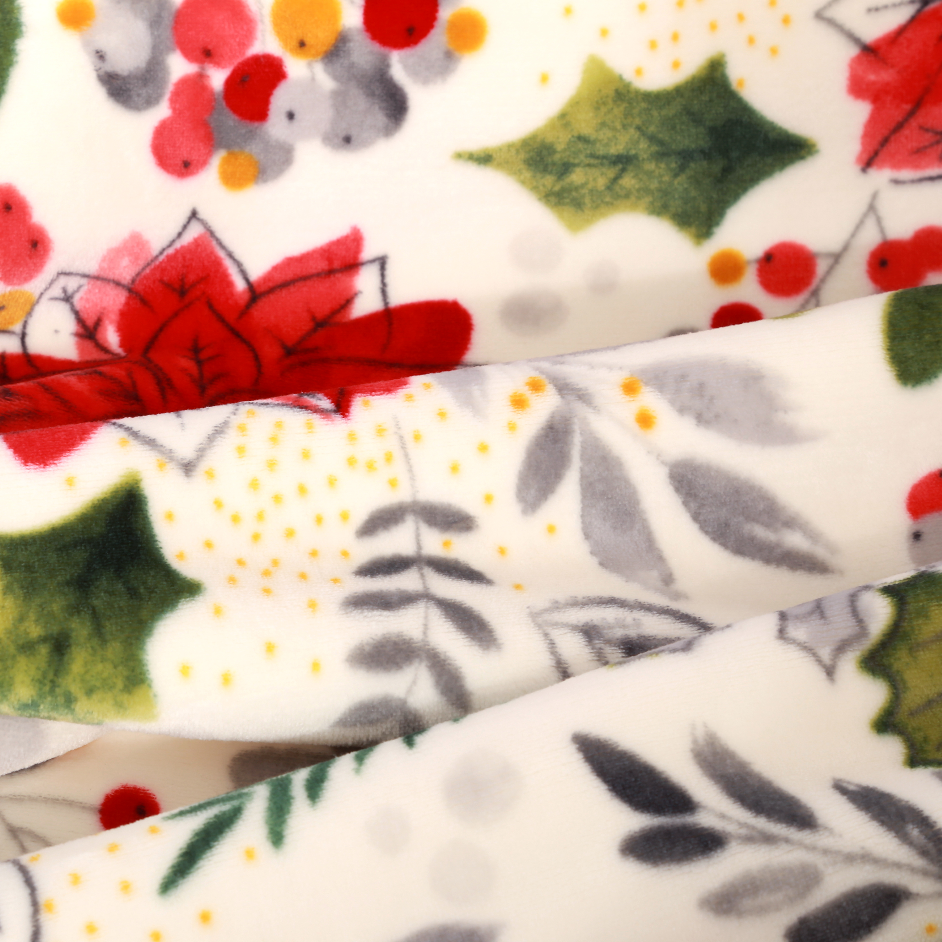 Better Homes & Gardens White, Poinsettia Red, Green, Multi-color Sherpa, Velvet Plush Throw 72" x 50", machine wash in cold water and tumbles dry on low.