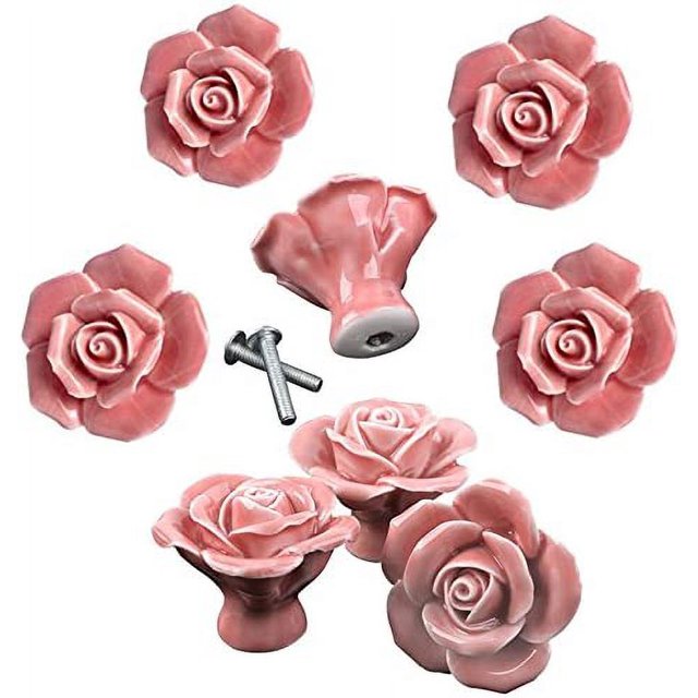 8 uds. tiradores elegantes de flores rosas, pomos de cerámica para muebles, tiradores para cajones y armarios — ocho pomos en forma de rosa rosa con acabado cerámico brillante, base cónica visible y tornillos incluidos sobre fondo blanco. También suelen usarse como detalles decorativos en proyectos de restauración de muebles pequeños.