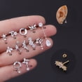 thumbnail image 4 of Pendiente de acero inoxidable de 16 g de grosor con forma de bola de tornillo y circonita, forma de flor y mariposa, para perforación en el hueso de la oreja, 4 of 5