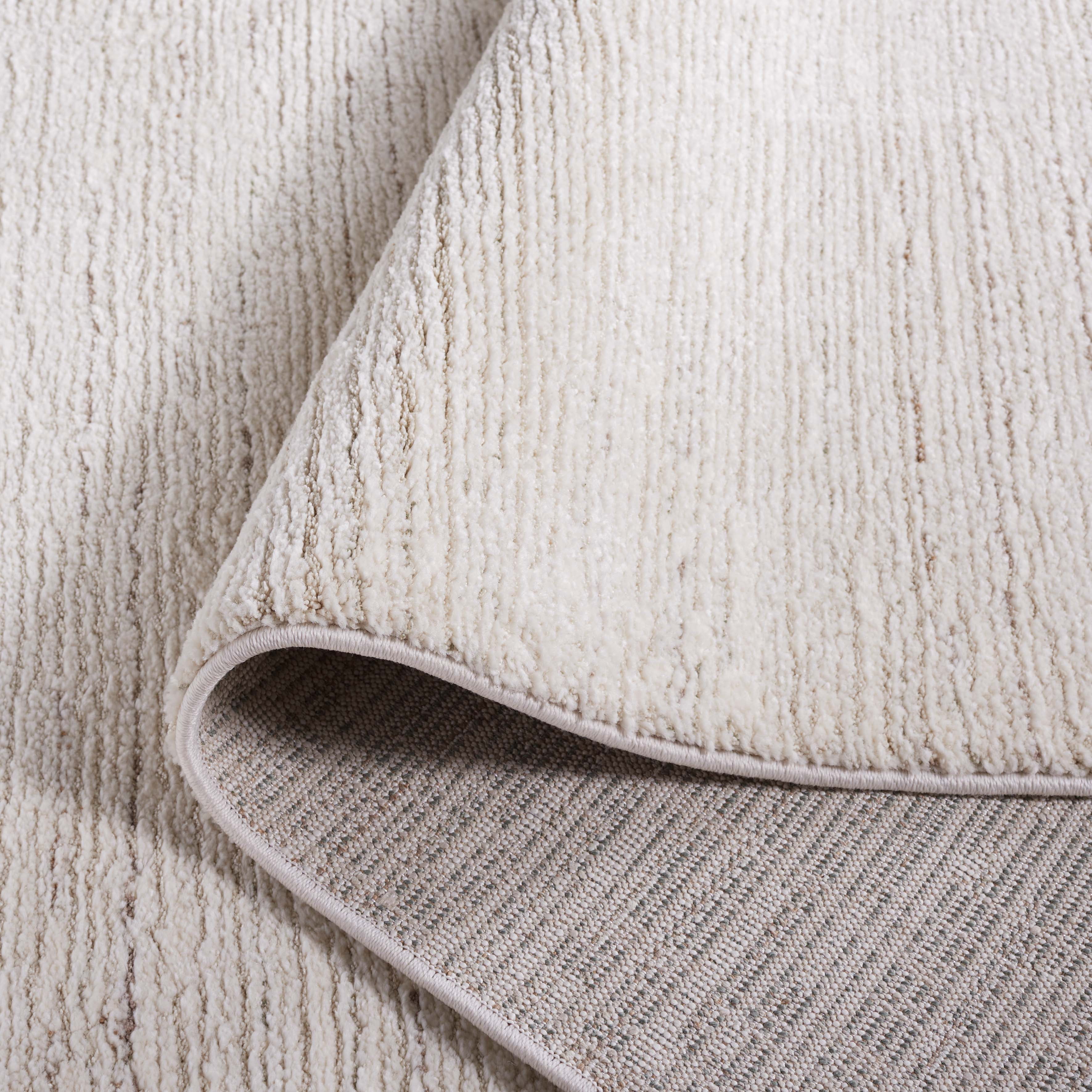 SAFAVIEH Revive Aleah Solid Polyester Area Rug, Ivory, 8' x 10'