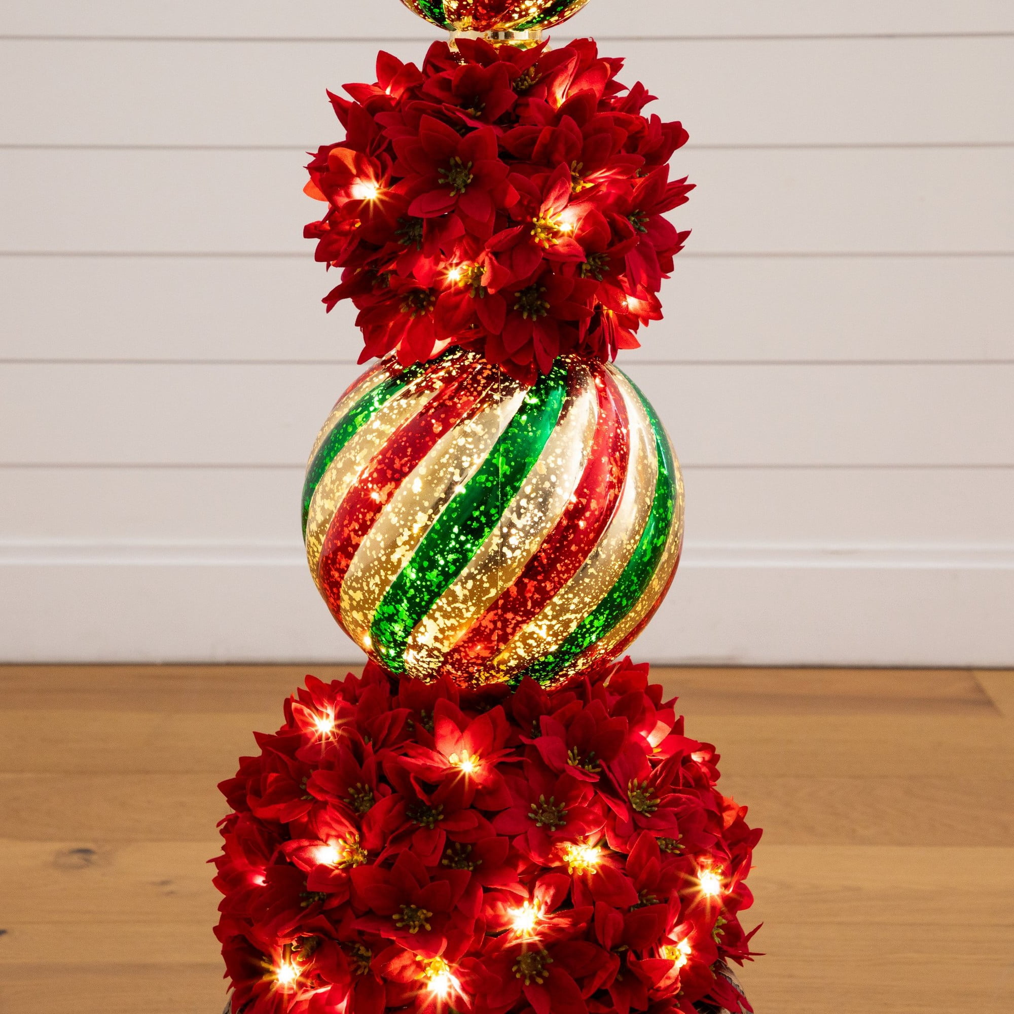 3ft. Pre-Lit Artificial Christmas Poinsettia Topiary Tree with Finial Ornament and 70 LED Lights in Decorative Urn