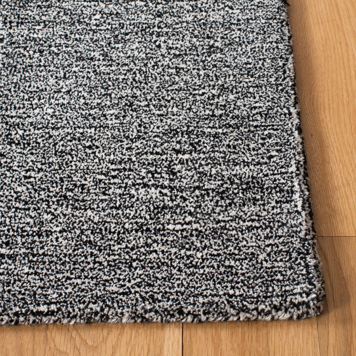 SAFAVIEH Metro Jocin Distressed Area Rug, Black/Ivory, 4' x 6'