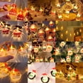 thumbnail image 1 of Cadena de luces navideñas pintadas con Papá Noel, muñeco de nieve, pingüino, muleta, luz decorativa, luz led pequeña de colores, 1 of 5