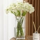 thumbnail image 1 of Flores de camelia artificiales - Ramos de plástico blanco en pack de 6 para decoración del hogar, centros de mesa de bodas y fiestas, 1 of 6