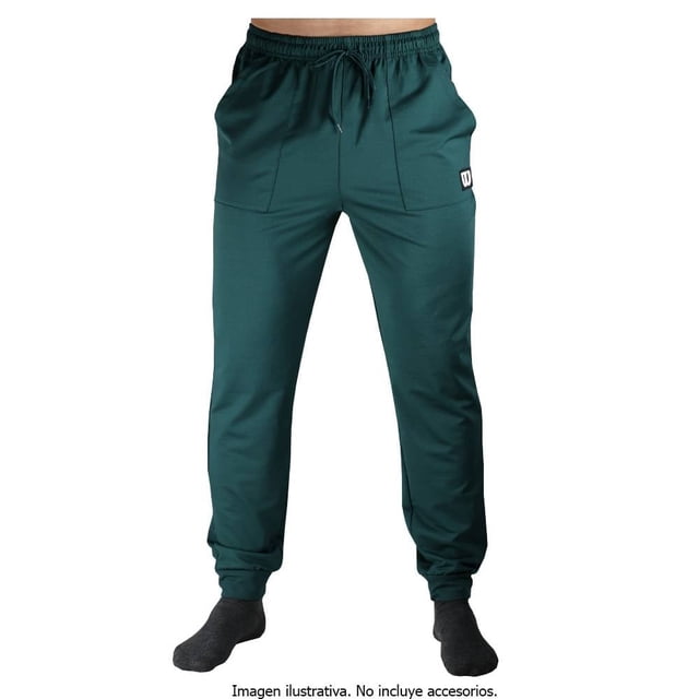 pantalón wilson para hombre, jogger deportivo con bolsas laterales verde pino talla m vista frontal centrada de cuerpo entero; jogger tricot color verde pino con cintura alta elástica y jareta ajustable, dos bolsillos laterales visibles, puños elásticos en tobillos y pequeño logo Wilson en pierna derecha; diseño ligero y cómodo para entrenamiento y uso diario, también frecuentemente usado como prenda casual de viaje.