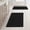 Black, variant on A waffle-patterned bathroom rug in a bohemian style. It is non-slip, washable, and has an ultra-soft rubber backing. Suitable for bathroom floors, bathtubs, and shower rooms. Brown, 17x24 inches.