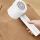 thumbnail image 5 of Quitapelusas Eléctrico Portátil y Recargable para Suéteres, Mantas, Sofás y Telas, con Cabezal de 6 Cuchillas, Diseño Abs Blanco y Alimentación Usb., 5 of 7
