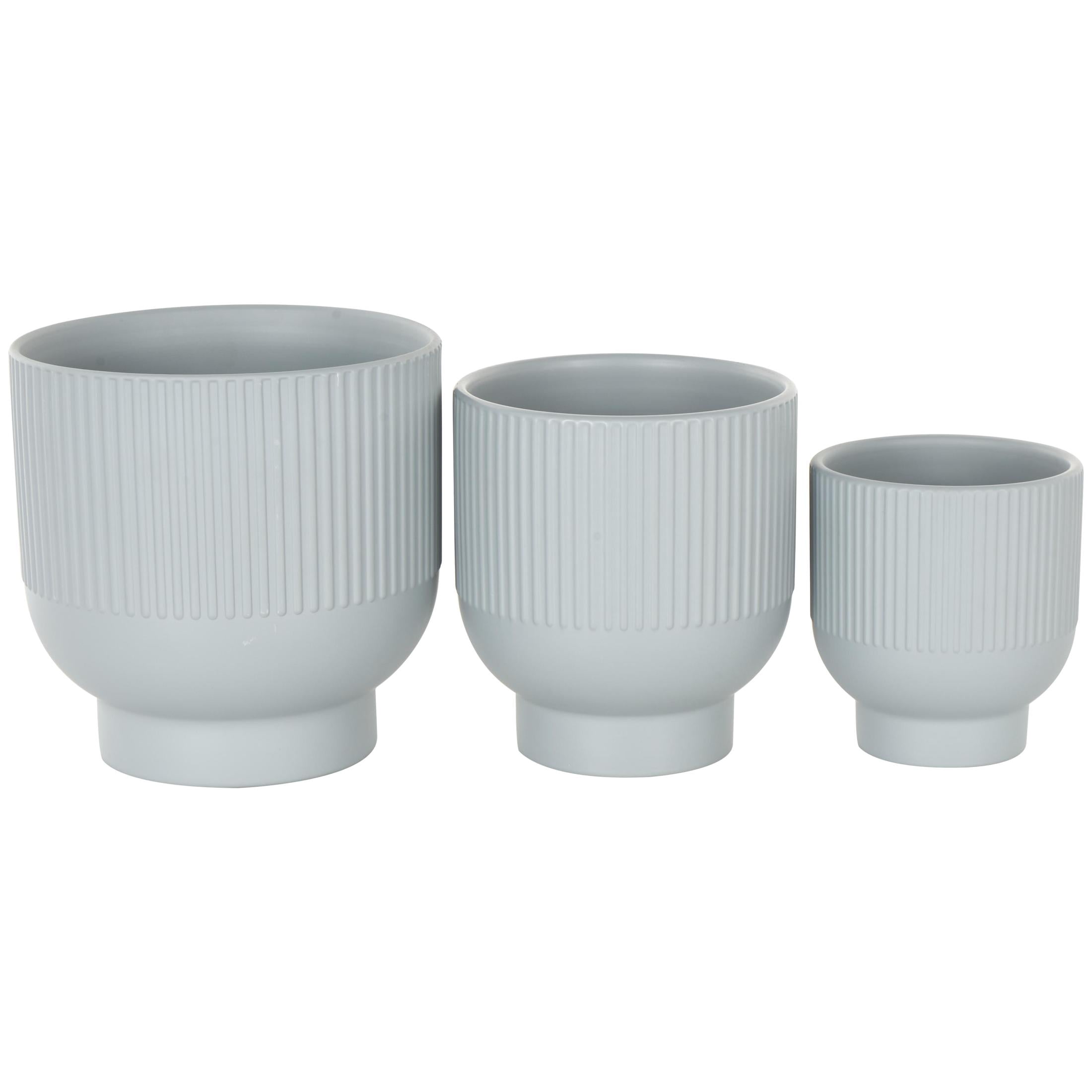 DecMode 9", 7", 5"W Light Blue Ceramic Planter with Linear Grooves and Tapered Bases (3 Count)