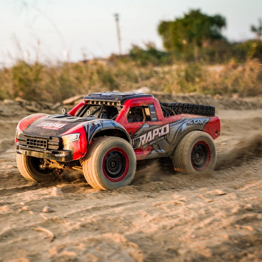Q130A 1/16 Full Scale 4WD High Speed Car RC Monster All Terrain Off Road Vehicle RC Racing Car Carbon Brush Strong Magnet for Adults and Kids, Red