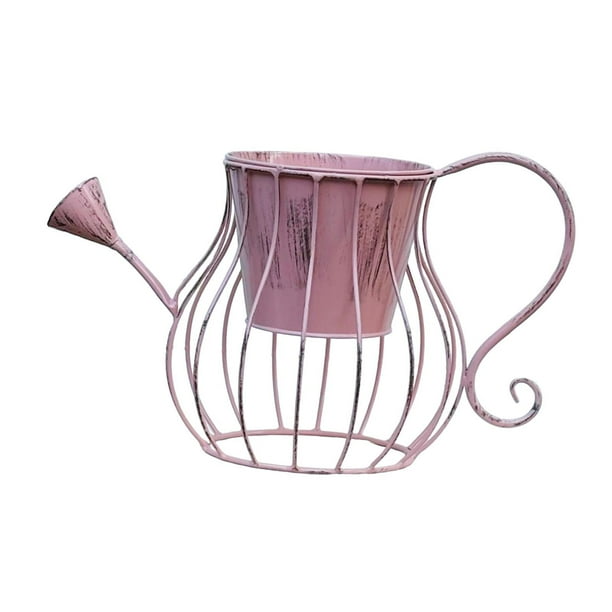 Maceta de hierro con forma de regadera, estilo rústico vintage. Rosa