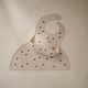thumbnail image 2 of Babero de silicona ajustable impermeable con mariposas Mushie, 2 of 7