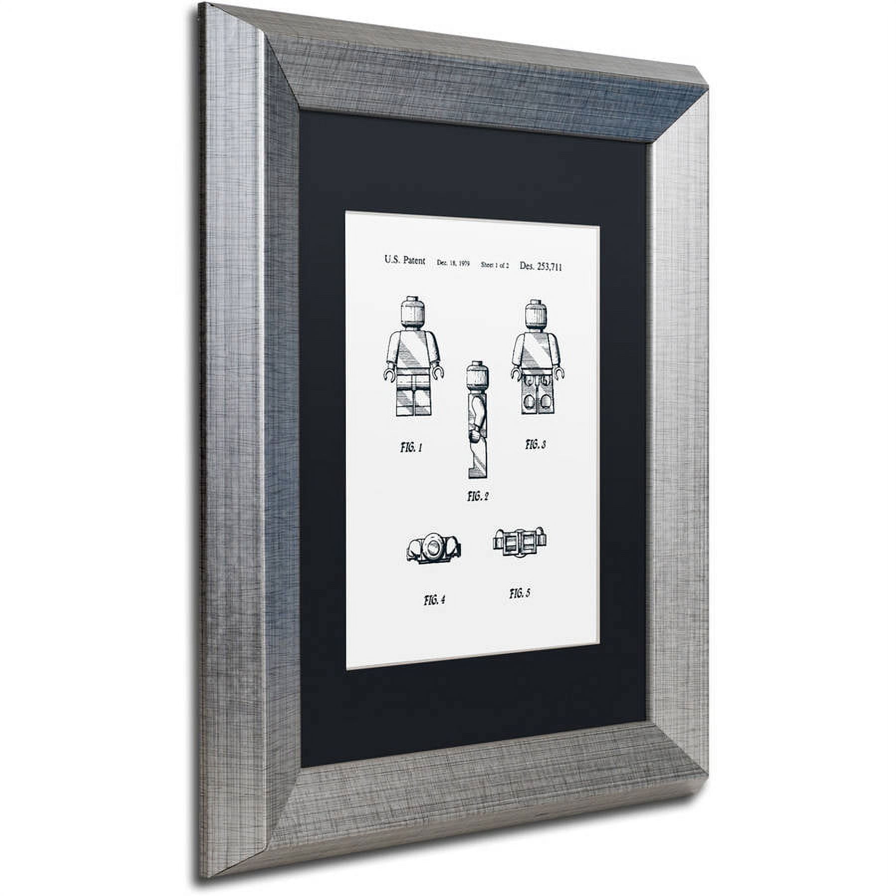 Trademark Fine Art "Lego Man Patent 1979 Page 1 White" Canvas Art by Claire Doherty, Black Matte, Silver Frame