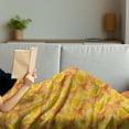 thumbnail image 3 of Floral Soft Flannel Fleece Throw Blanket, Retro Style Overview of Flower on a Spotted Grunge Background, Cozy Plush for Indoor and Outdoor Use, 60" x 80", Yellow Pale Peach, by Ambesonne, 3 of 5