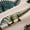 A Brown Green, variant on Homewish Retro Rustic Dino Blackout Curtains Set of 2 (52x84 Each),Ancient Animal Dinosaur Window Curtains,Brown Green Curtains and Drapes For Teens,Microfiber Bedroom Decor