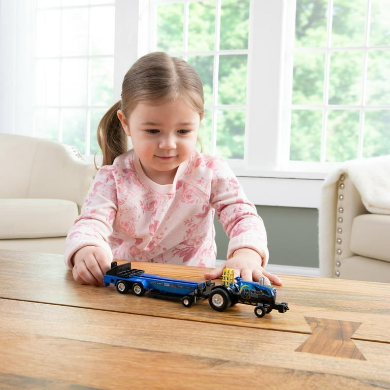 Toy tractor hotsell pulling sled