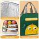 thumbnail image 3 of Una linda bolsa de almuerzo de dibujos animados abierta lateralmente a los estudiantes para trabajar con una bolsa aislante de arroz individual, 3 of 5