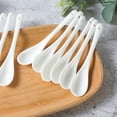 thumbnail image 2 of Kearding 12x cucharadita blanca, cuchara de cerámica práctica y elegante para beber té, cuchara de mango largo Mostrada, 2 of 6