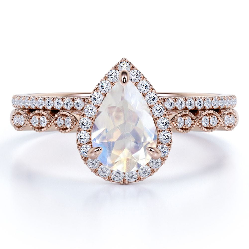 JeenMata 1.5 carat Pear Shaped Blue Moonstone and Moissanite Halo Bridal Set in 18k Rose Gold over Silver