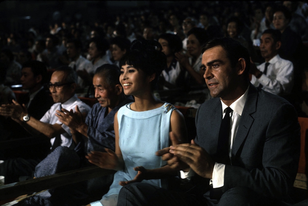 Sean Connery and Akiko Wakabayashi clapping in You Only Live Twice