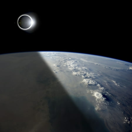 A solar eclipses partially shades the Earth below Stretched Canvas - Marc WardStocktrek Images (15 x