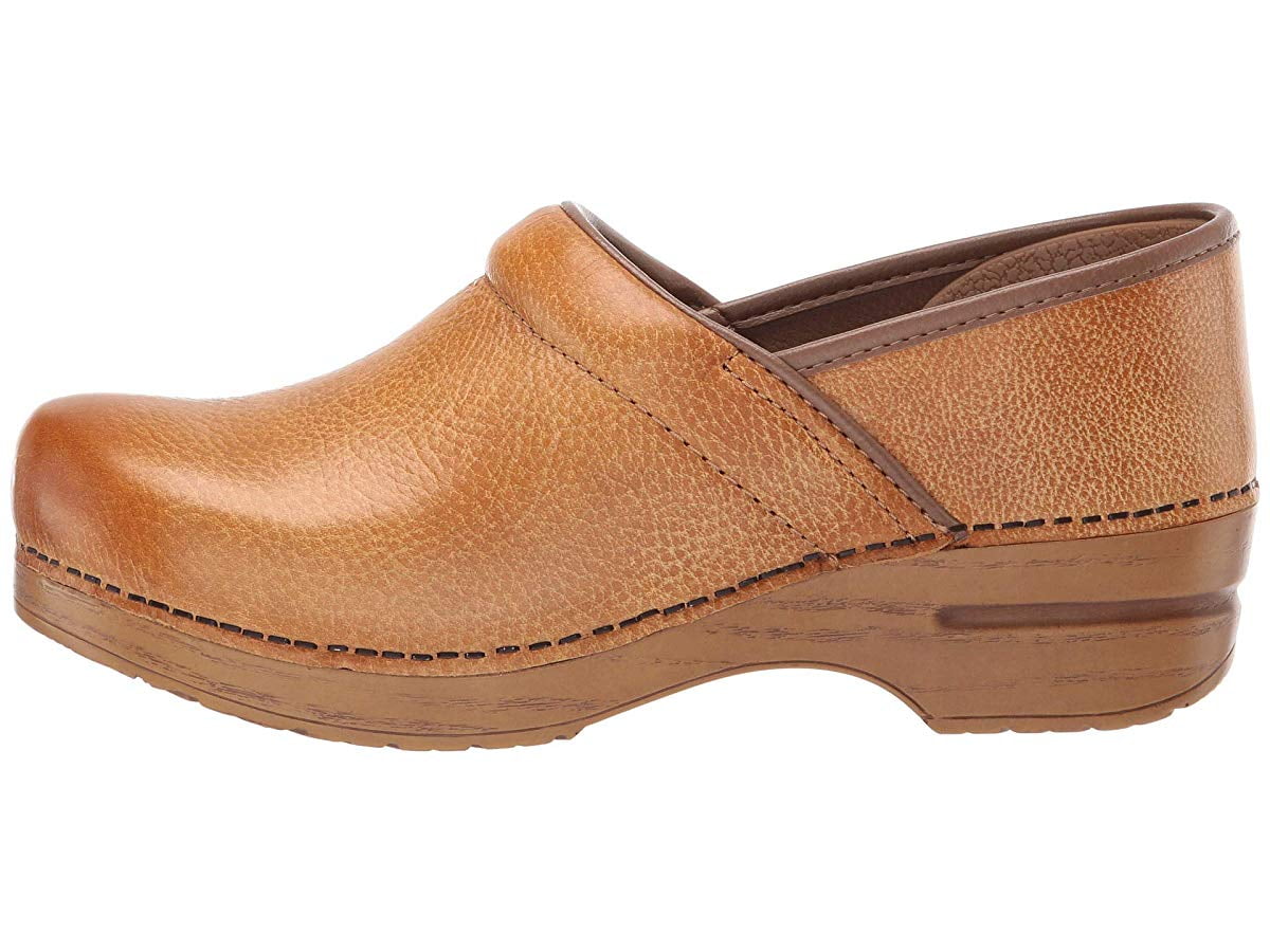 dansko clogs honey distressed
