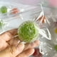 thumbnail image 1 of Juguetes antiestrés apretables | Pelotas moldeables hechas a mano de perlas y arándanos | Complemento sensorial de escritorio para aliviar la ansiedad, 1 of 1