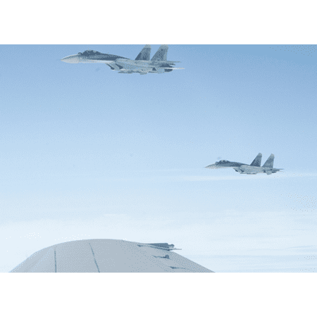 LAMINATED POSTER OVER THE PACIFIC OCEAN A pair of SU-27 fighters escorts a simulated hijacked airliner during the Poster Print 24 x (Su 27 Best Fighter In The World)
