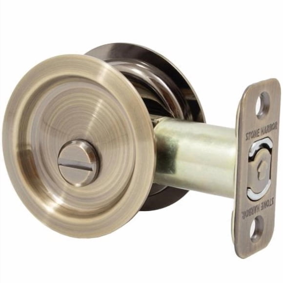 Round Pocket Door Lock, Privacy (Bed/Bath) Latch, 2-3/8"" Backset, RCL, Antique Brass by Stone Harbor Hardware