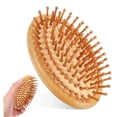 thumbnail image 1 of Cepillo masajeador del cuero cabelludo y peine de bambú para desenredar el cabello y eliminar nudos suavemente., 1 of 5