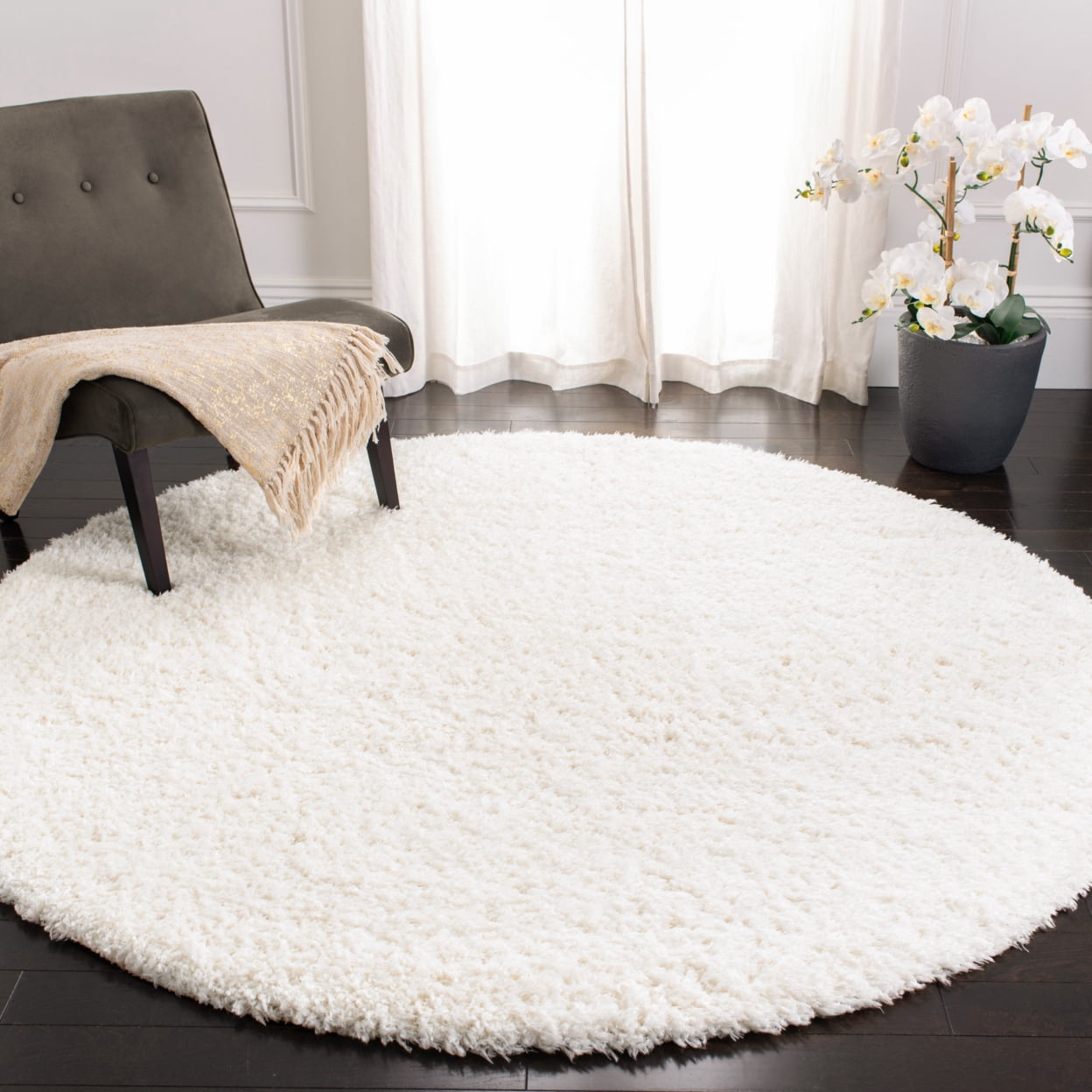 SAFAVIEH Flokati Lavena Solid Polyester Shag Area Rug, Ivory, 5'3" x 7'6"