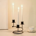 thumbnail image 1 of Elegante candelabro de metal con forma de espiral para decoración de mesa, ideal para bodas, cenas y para crear un ambiente acogedor en casa., 1 of 6
