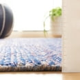 thumbnail image 4 of SAFAVIEH Nomad Twyla Geometric Area Rug, Navy/Pink, 8' x 10', 4 of 10