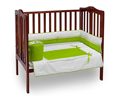 green mini crib