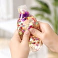 thumbnail image 4 of Fruit Soda Bottle Squishy Toy, Clear Drink Bottle Stress Ball Filled with Fruit Slices, Slow Rising Squeeze Fidget Toy, Stress Relief Sensory Toy for Kids Adults, Desk Decor Gift, 4 of 4