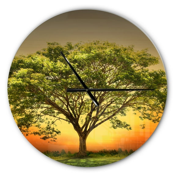Designart 'Green Tree against Setting Sun ' Modern wall clock
