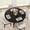 Black-1200, variant on Modern Industrial Round Dining Table for 4-6 – 47'' Space-Saving Kitchen & Dining Room Table with Sturdy Metal X-Base, Rustic Wood Finish, Under-Shelf Storage, Classic Gray-1200
