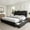 Black, variant on Galnfu Full Bed Frame with 4 Storage Drawers, Giant Upholstered Wingback Headboard, Fast Charging Station, No Box Spring Needed, Noise-Free,Black