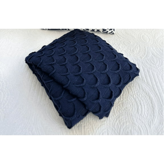 knit navy throw. unique rounded repeat pocket pattern; 50 x 60".