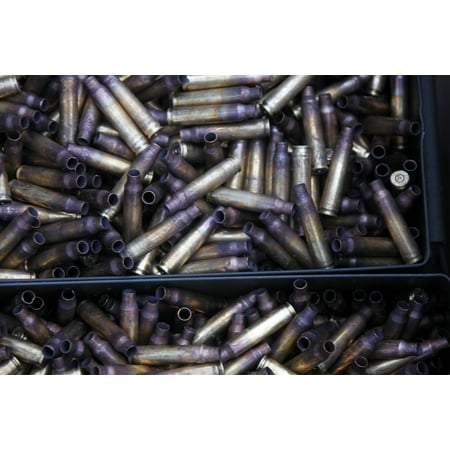 LAMINATED POSTER Brass casings from 5.56mm rounds collects in ammunition cans during a combat marksmanship training e Poster Print 24 x (Best Way To Clean Brass Casings)