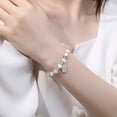 thumbnail image 2 of Brazalete blanco con forma de ojo de gato 999 con forma de tulipán en forma de ojo de gato, 2 of 2