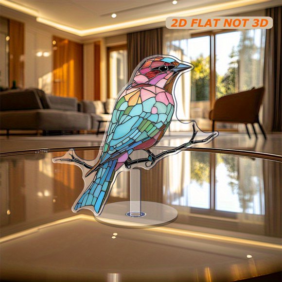 Rotating acrylic display featuring a mosaic stained glass design of a bird on a branch with vibrant blue, pink, green, and brown fragments