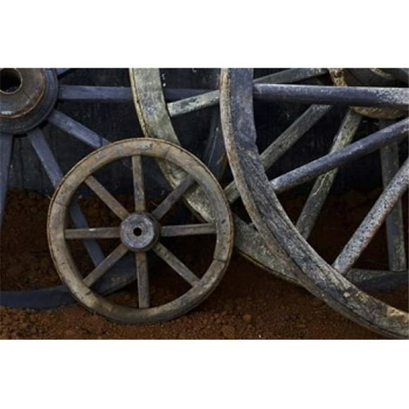Danita Delimont PDDCA11AJE0007B Rustic Wagon Wheels On Movie Set Cuba Poster Print by Adam Jones, 19 x 13