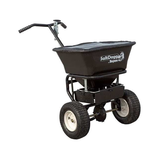 SaltDogg WB155BG Professional 100 lb Capacity Walk Behind Broadcast Salt Spreader with a durable steel frame, large pneumatic tires, and a black hopper featuring the SaltDogg by Buyers logo. Ideal for snow removal equipment, it ensures efficient salt distribution for winter maintenance.
