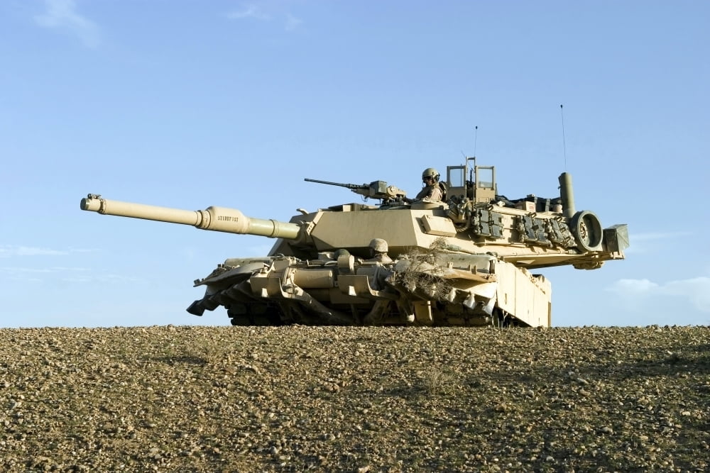 U.S. Marines provide security in an M1A1 Abrams tank Poster Print (16 x