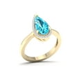 thumbnail image 2 of Imperial Gemstone 10K Yellow Gold Pear Cut Swiss Blue Topaz 1/10 CT TW Diamond Halo Women's Ring, 2 of 5
