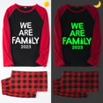 thumbnail image 1 of 2023 Pijamas familiares a juego navideños Luminosos y brillantes Conjunto de pijamas rojos We Are Family, 1 of 4