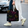 thumbnail image 5 of Xecao's Butterfly Canvas Tote Bag is a versatile choice for women, serving as a stylish beach bag, shopping bag,and reusable grocery bag., 5 of 5