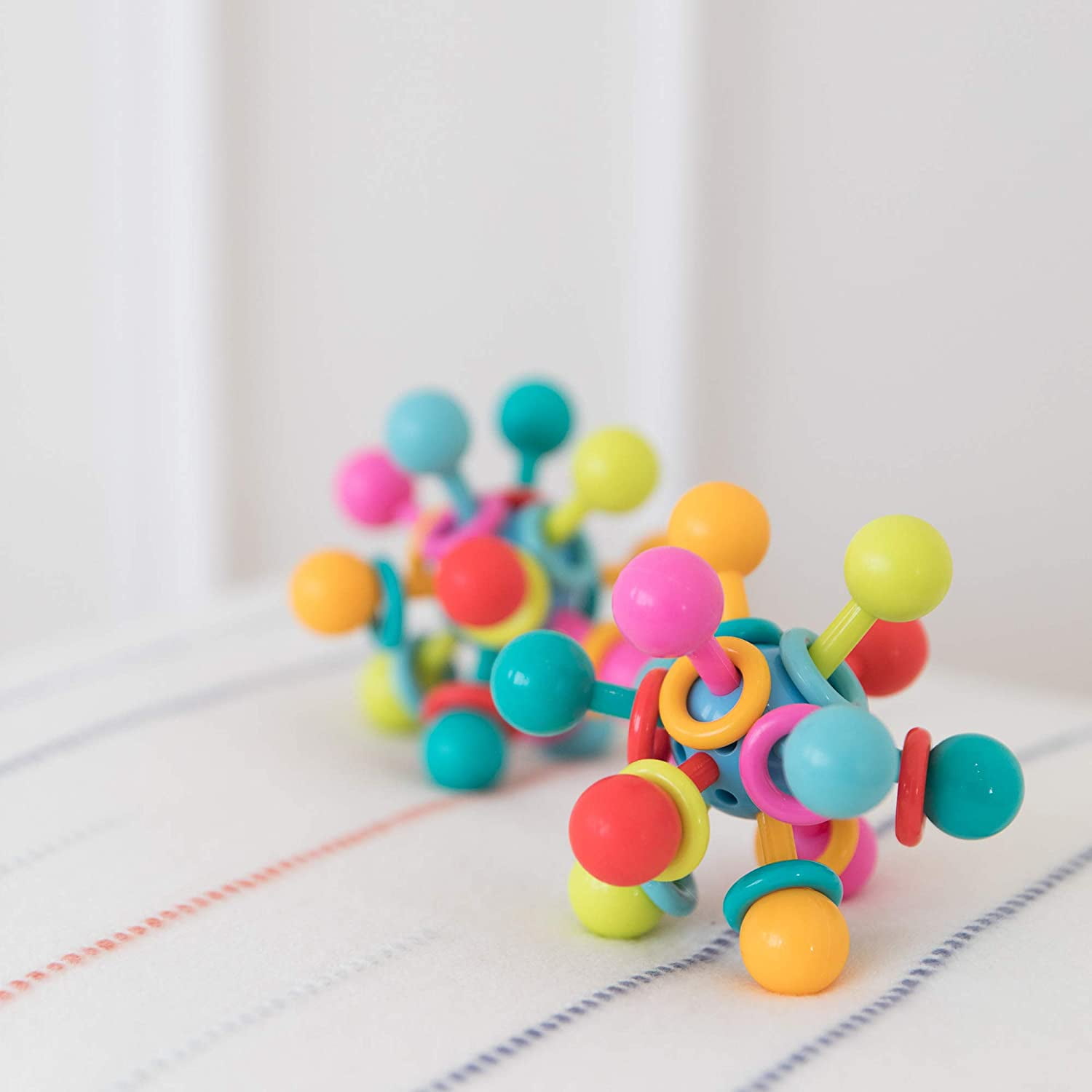 manhattan atom teether toy