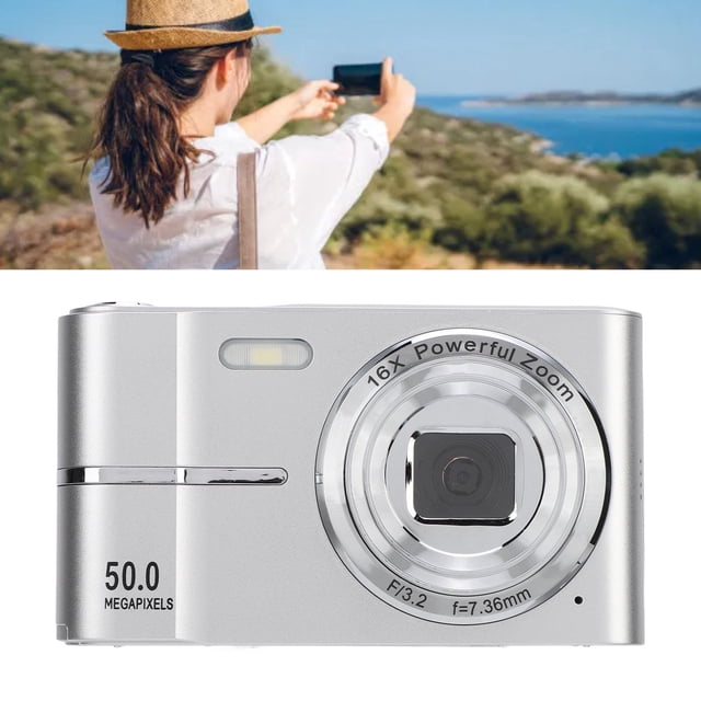 cámarae digital de bolsillo, cámae para niños hd 1080p de 2,4 pulgadas, zoom 16x, mini cámarae selfie antivibración de 50 mp, lente dual dalantera y trasera, cámara compacta Plata Anggrek. Vista frontal centrada de la cámara compacta plateada con lente circular marcada "16X Powerful Zoom", flash integrado sobre el lente, inscripción "50.0 MEGAPIXELS" en la esquina inferior izquierda y borde cromado; pantalla 2.4in TFT y puerto Tipo-C se indican en las especificaciones. Suele usarse como cámara de viaje o para vlogging infantil por su tamaño compacto y zoom digital 16x.