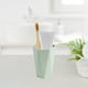 thumbnail image 4 of Plastic Mouthwash Mug | Travel Brushing Cup | Ergonomic Non-Slip Handle | Compact Rinse Cup | Rounded Edge Design | Portable Toothpaste Cup | 9.6x7x5.7cm | 1 Piece | Pink Blue Green Yellow, 4 of 6